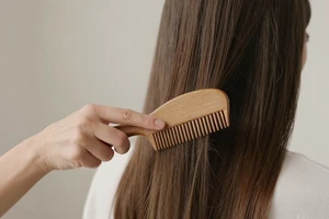 The Daily Brushing Habit That May Be Causing Thinning Hair
