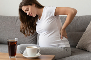3 Drinks to Avoid When You Have Pregnancy Back Pain, According to Dietitians